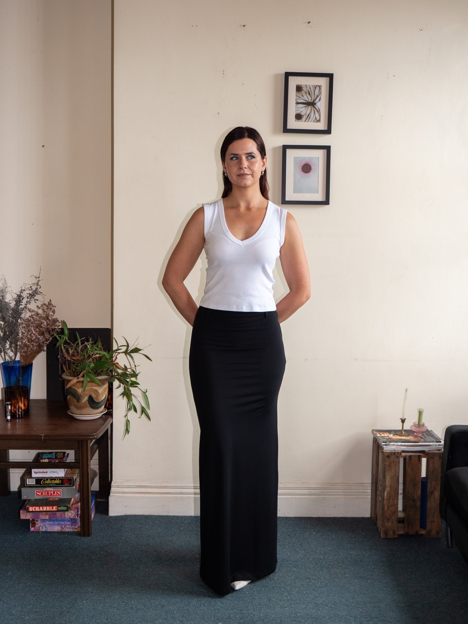 High-waisted long pencil skirt worn full length, black