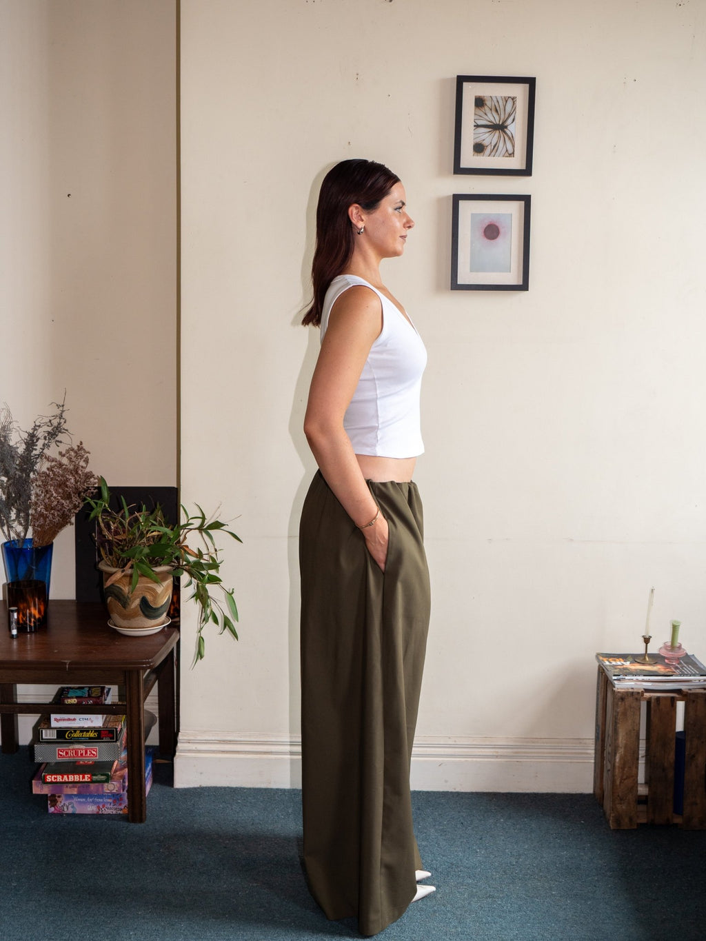 Side view of relaxed wide-leg pants, green