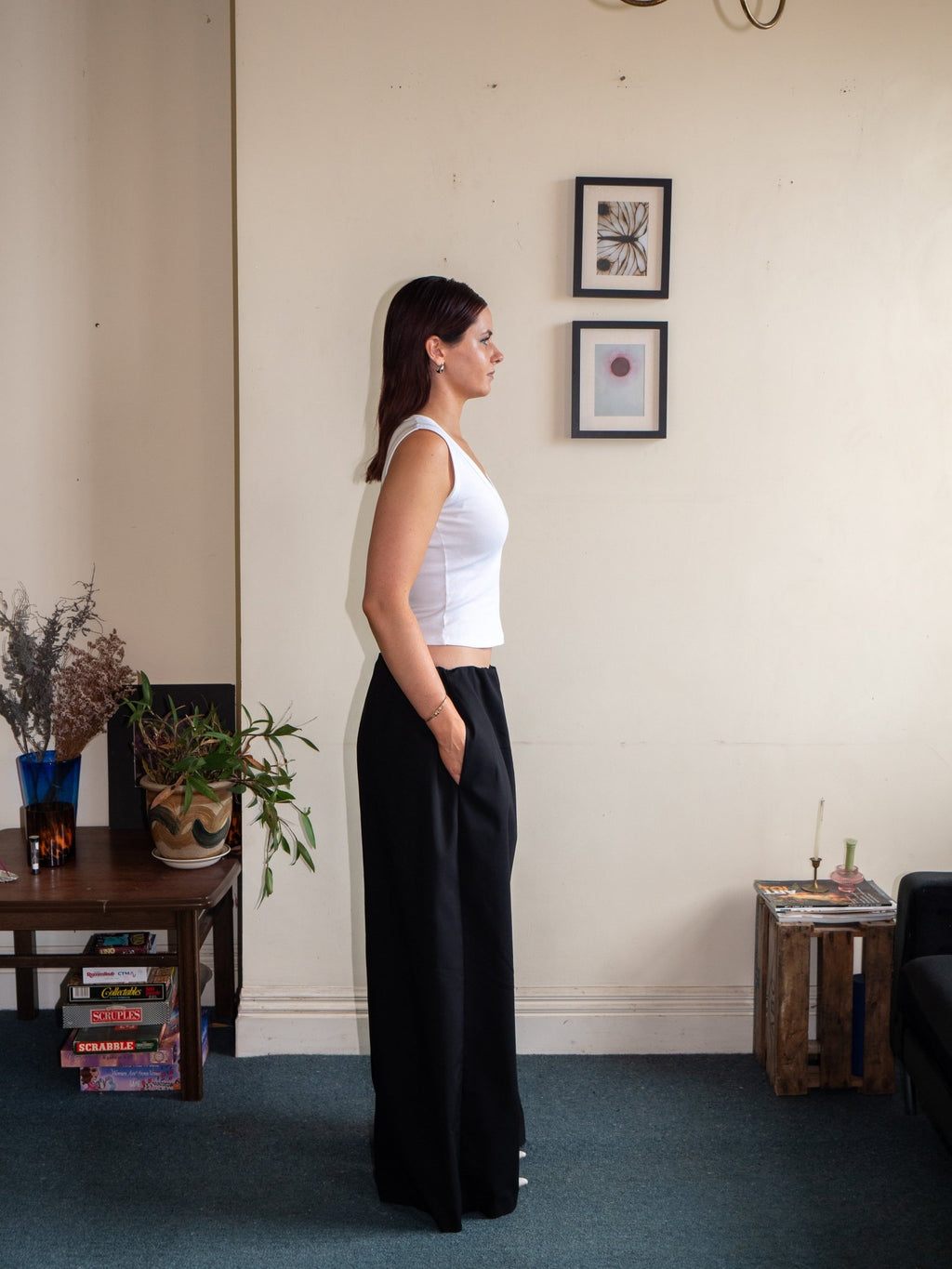 Side view of relaxed wide-leg pants, black